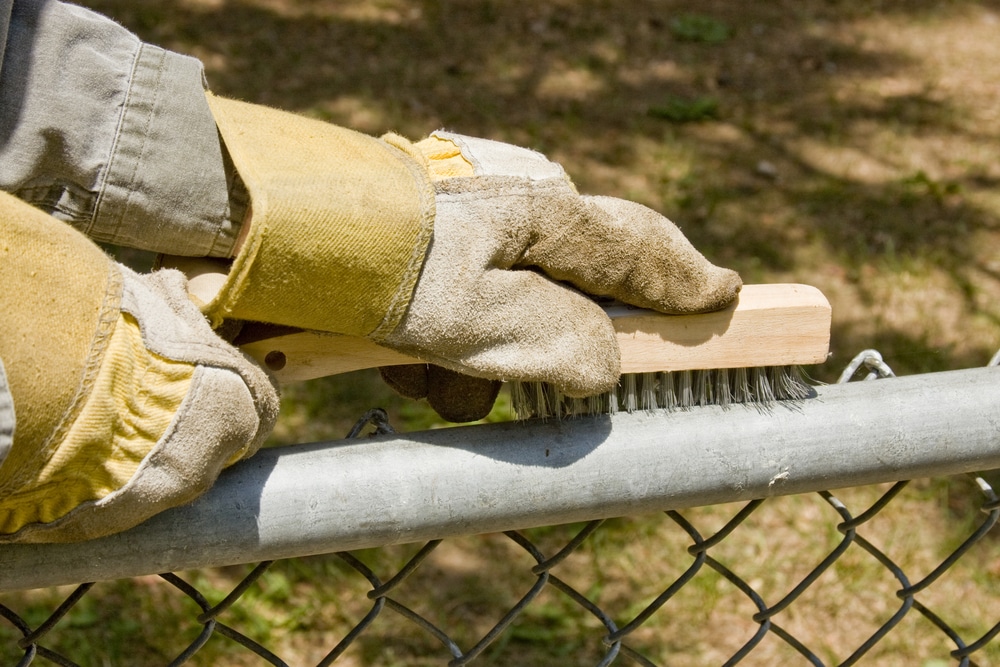 Wire Brushing A Fence