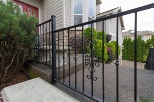 Wrought Iron Railings On Steps To House Front Door Entrance Closeup