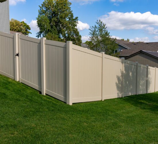 Tan Vinyl Privacy Fence with Gate